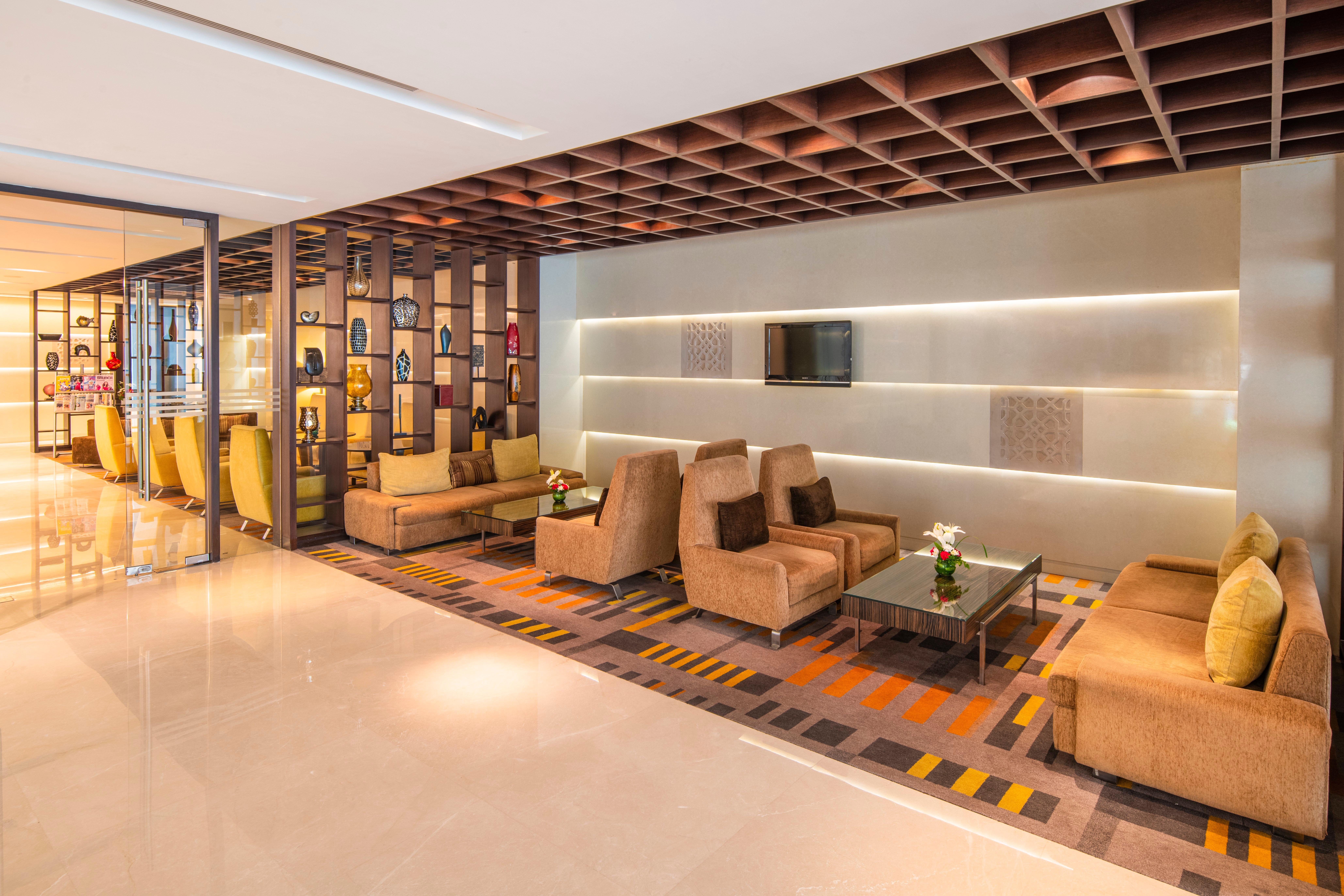 Holiday Inn Mumbai International Airport By Ihg Bagian luar foto The lounge at the airport